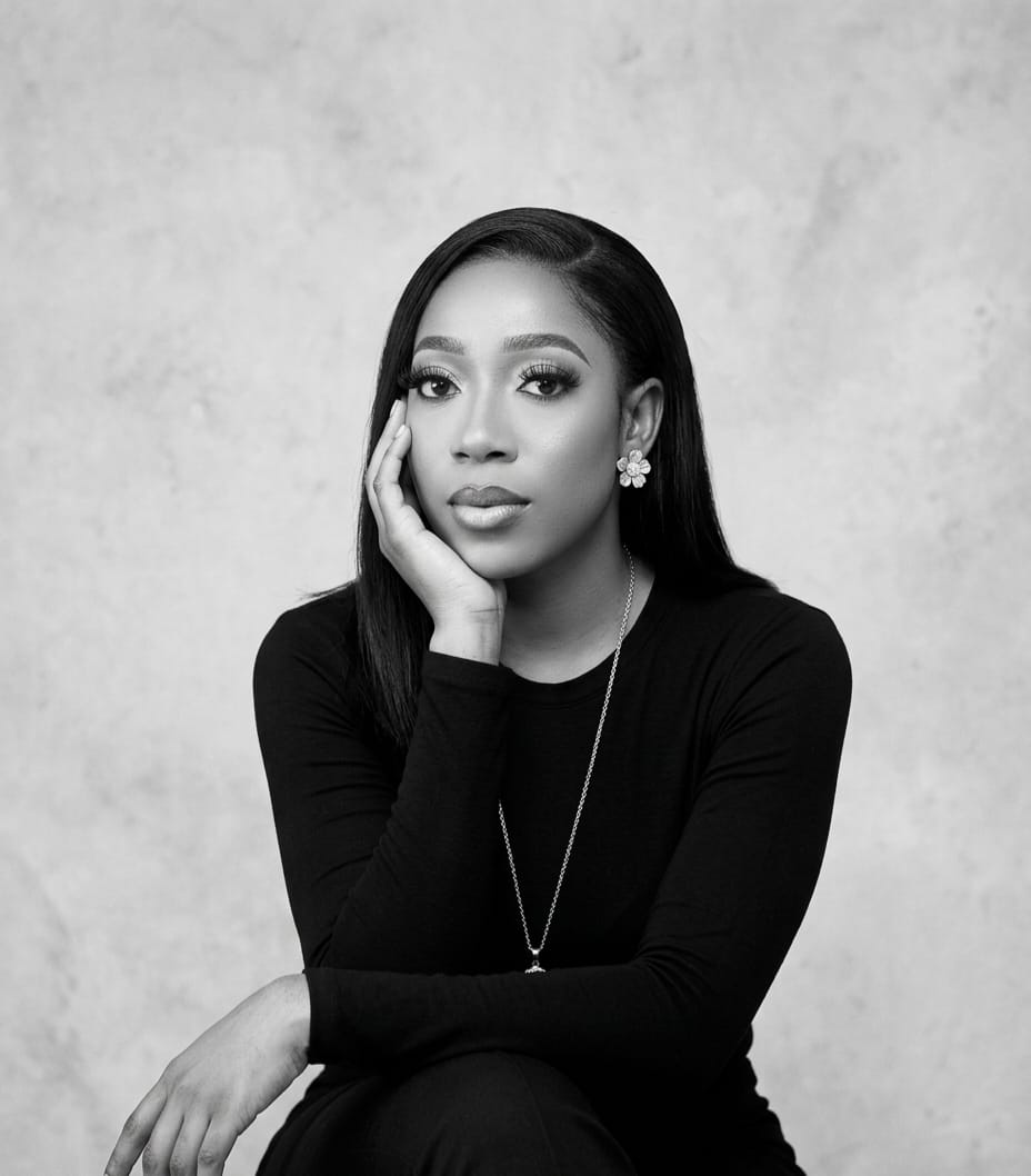 Reflective black-and-white portrait of Love